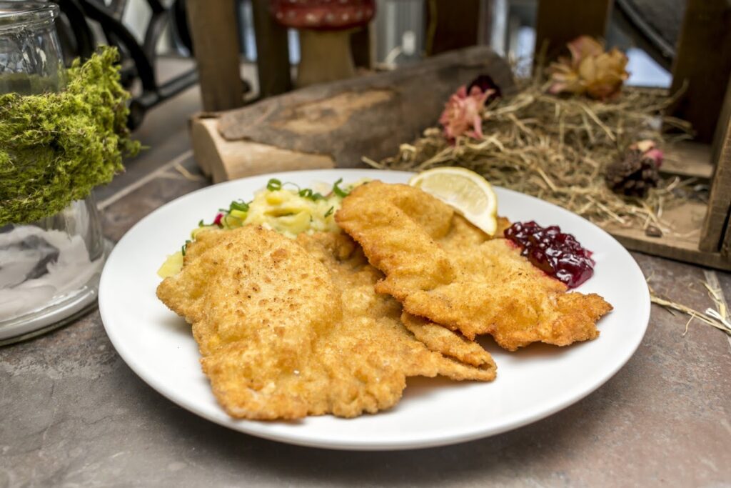 Crispy Wiener Schnitzel can be eaten at the Austrian Restaurant Miteinander